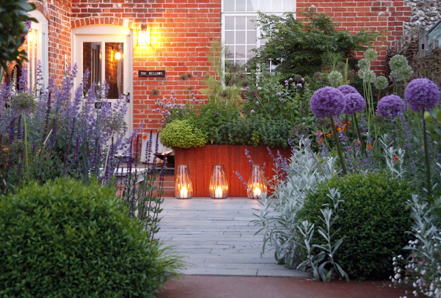 warm evening light shows off the greencube foundry garden, Great Walsingham, Norfolk