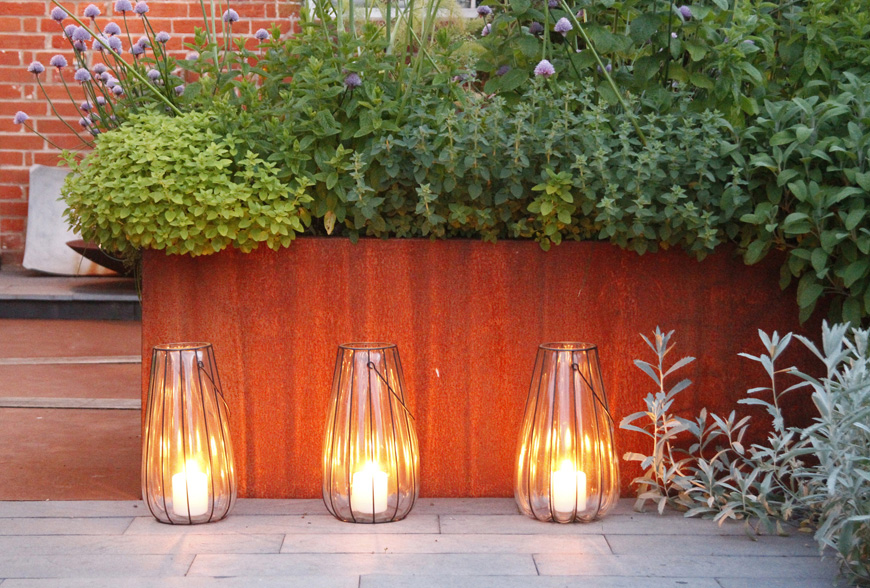 candles glowing in the evening light, Great Walsingham, Norfolk